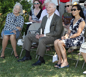 Gordon Gund, center, at the dedication ceremony for his sculpture, "Flukes," which he donated to the MBL. To is right is Lulie Gund, his wife; on his left is MBL Board of Overseers member Dina Gu Laties.