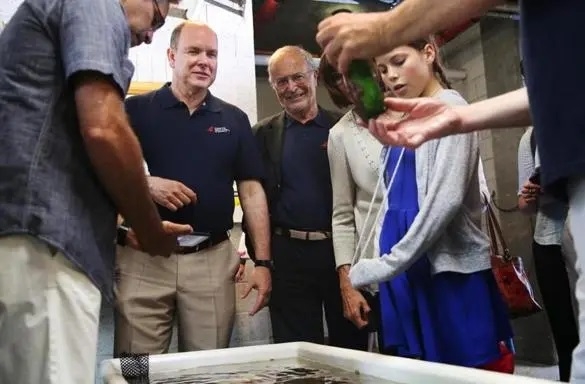 Prince Albert II of Monaco, 2nd from left, visited the Marine Biological Laboratory in Woods Hole. Influenced by his grandfather Prince Albert I, who was an avid oceanographer, the prince made a donation to the laboratory. Credit: Erin Clark for The Boston Globe